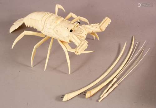 A JAPANESE CARVED IVORY RETICULATED MODEL OF A CRAYFISH, 29c...