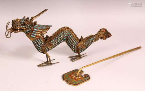 A CHINSE GILT METAL MODEL OF A DRAGON, inset with turquoise ...
