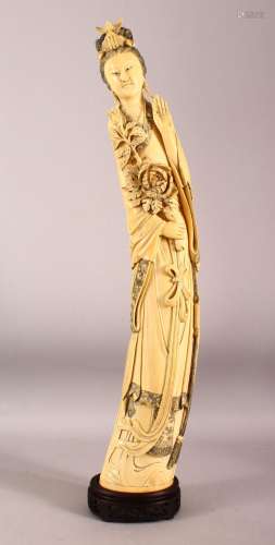 AN IMPRESSIVE LARGE CHINESE IVORY TUSK CARVING OF A STANDING...