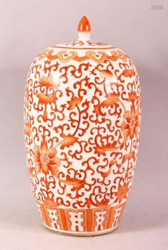 A CHINESE IRON RED JAR & COVER - decorated with formal l...