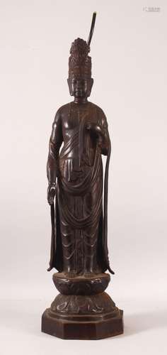 A LARGE CHINESE BRONZE STATUE LAMP, the figure with one hand...