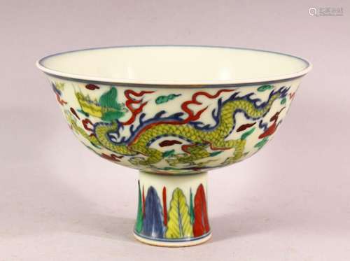 A CHINESE DOUCAI DECORATED PORCELAIN STEM BOWL - decorated w...