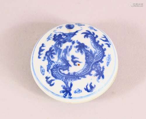 A CHINESE BLUE AND WHITE CIRCULAR PORCELAIN BOX, the inside ...