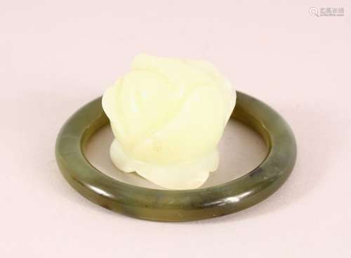 A CHINESE JADE CARVING AND JADE BANGLE, the bangle 8cm diame...