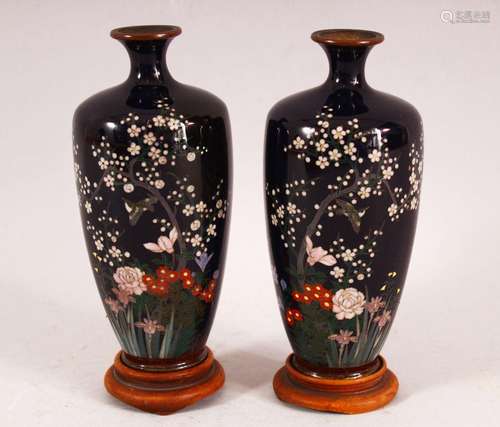 A FINE PAIR OF JAPANESE MEIJI PERIOD CLOISONNE VASES AND STA...