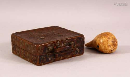 AN EARLY TIBETAN CEREMONIAL SHELL AND AN 18TH CENTURY COPPER...