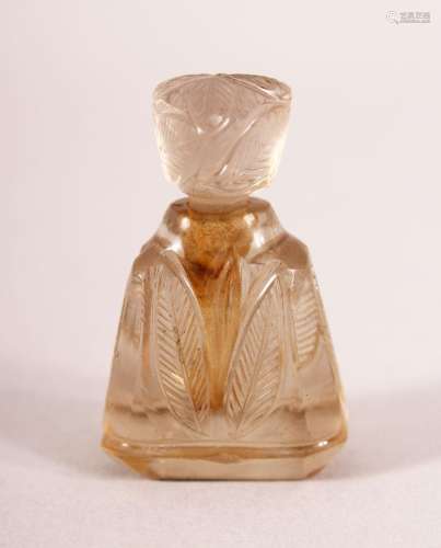 A VERY SMALL INDIAN CARVED ROCK CRYSTAL PERFUME BOTTLE AND S...