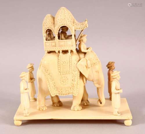 A FINE 19TH CENTURY INDIAN CARVED IVORY ELEPHANT GROUP, the ...