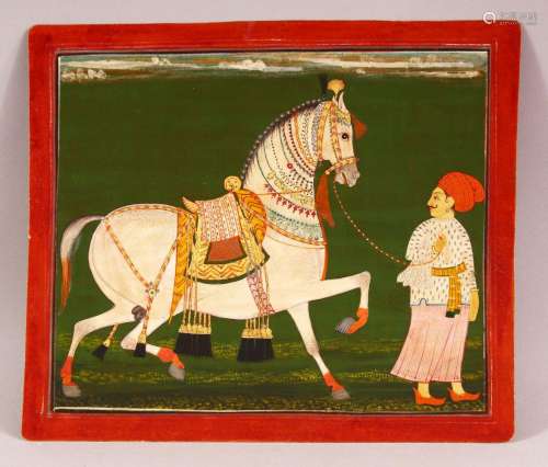 A FINE 19TH CENTURY INDIAN MINIATURE PAINTING OF A MAN AND H...