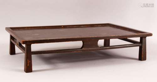 A SMALL CHINESE LOW WOOD TABLE - 31cm x 46cm