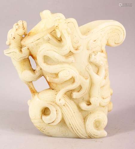 A LARGE CHINESE CARVED JADE LIBATION CUP WITH CHILONG - the ...