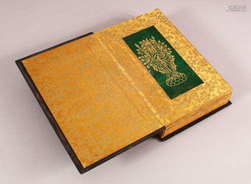 A CHINESE BOOK OF JADE GILT CARVINGS, the pages opening to r...