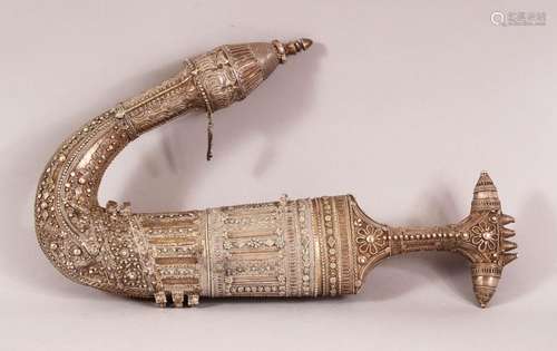 A ISLAMIC WHITE METAL ABDI JAMBIYA DAGGER - with raised whit...