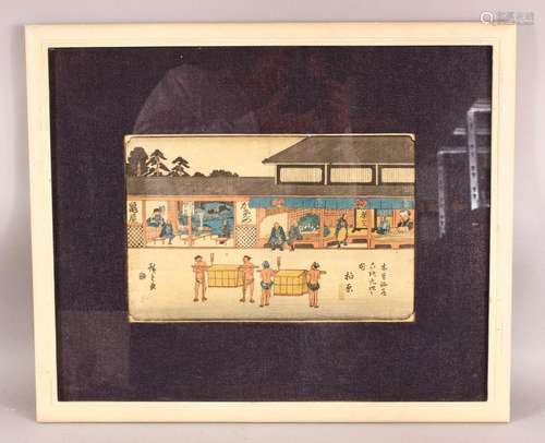 A JAPANESE FRAMED WOOD BLOCK PRINT - depicting figures in vi...