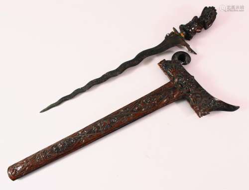 A GOOD INDONESIAN CARVED WOODEN SWORD / DAGGER, the well car...