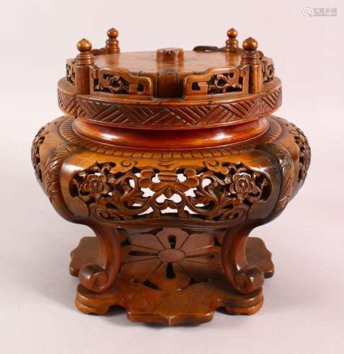 A JAPANESE MEIJI PERIOD CARVED WOODEN REVOLVING VASE STAND, ...