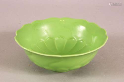 A CHINESE GREEN GLAZED LOTUS FORMED PORCELAIN PETAL DISH - w...