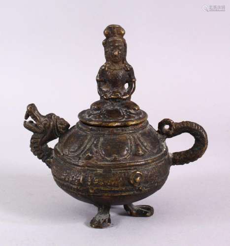 AN EARLY CHINESE OR SOUTH EAST ASIAN BRONZE LIDDED OIL LAMP,...