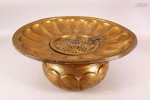 A LARGE 18TH/19TH CENTURY PERSIAN BRASS BASIN, with hinged l...