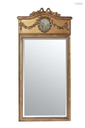 A GILT COMPOSITION PIER MIRROR