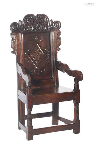 AN OAK JOYNED ARMCHAIR OR WAINSCOT CHAIR