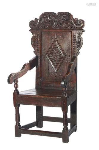 AN OAK JOYNED ARMCHAIR OR WAINSCOT CHAIR