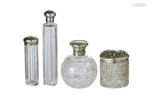 A GROUP OF FOUR VICTORIAN SILVER MOUNTED TOILET JARS