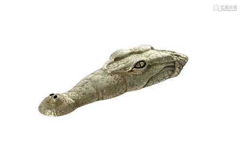 A ZIMBABWEAN SILVER SUBMERGED CROCODILE BY PATRICK MAVROS