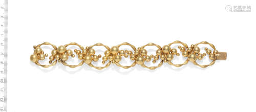 TEXTURED CIRCULAR LINK BRACELET, CIRCA 1970