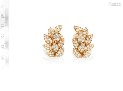 VAN CLEEF & ARPELS: DIAMOND-SET LEAF EARCLIPS, CIRCA 1965