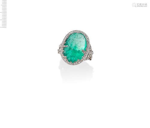 EMERALD CAMEO AND DIAMOND RING, FIRST HALF OF THE 20TH CENTU...