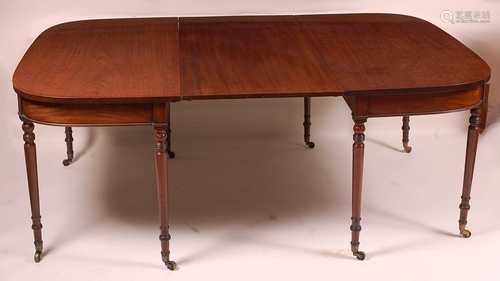 A George III mahogany double D-end dining table (later adapt...