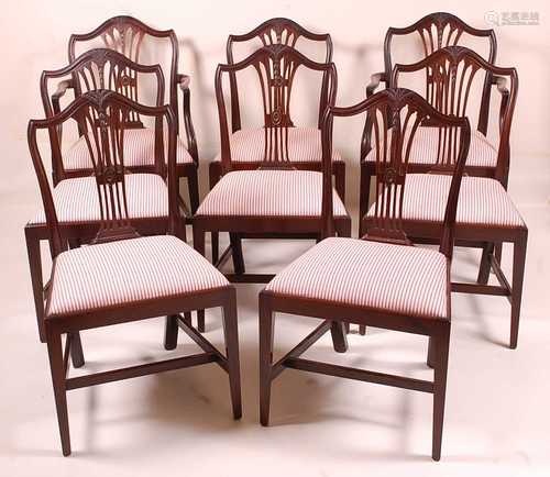 A set of eight mahogany dining chairs in the Heppelwhite sty...