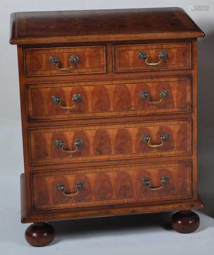 A walnut and yew wood oyster veneered chest, in the William ...