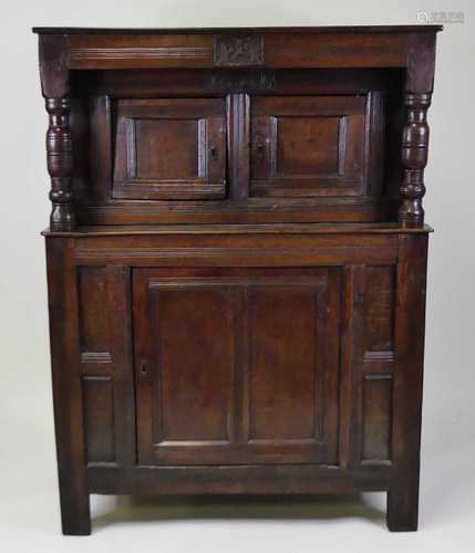 A late 17th century joined oak court cupboard, the upper sec...