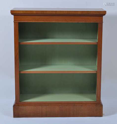 A walnut and figured walnut freestanding open bookshelf, in ...