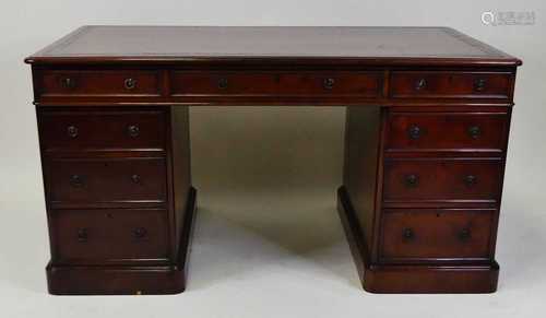 An early Victorian mahogany twin pedestal partner's desk, ha...