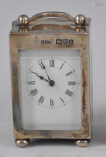 An Edwardian silver cased minuet carriage clock, having plai...