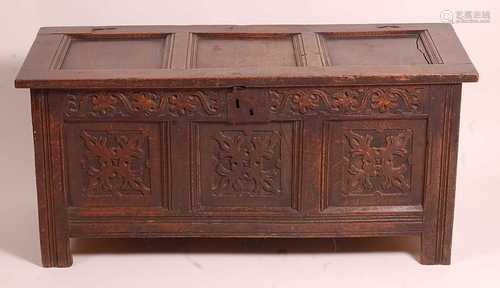 A late 17th century joined oak three panel coffer, on origin...