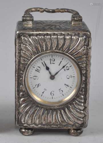 A late Victorian silver cased minuet carriage clock, having ...