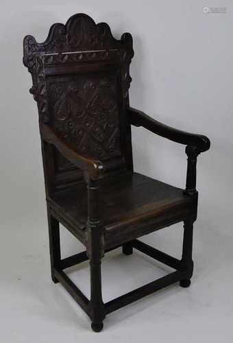 An early 18th century joined oak Wainscot chair, having a on...