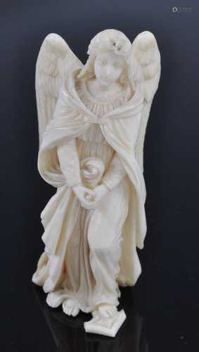 A 19th century Continental carved ivory figure of a winged a...