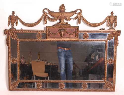 A circa 1900 gilt composition wall mirror in the Adam style,...