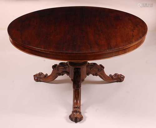 An early Victorian rosewood pedestal breakfast table, having...