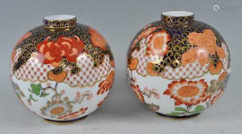 A pair of Victorian Royal Crown Derby vases, each of globula...