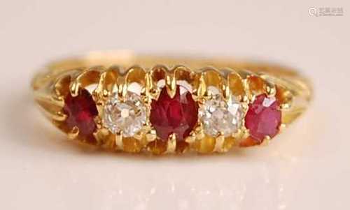 An Edwardian 18ct yellow gold, ruby and diamond five stone h...