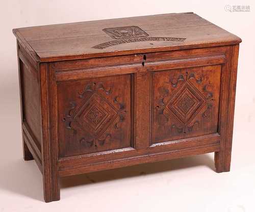 A 17th century joined oak two-panel coffer, the two plank to...