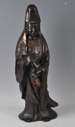 A Chinese bronze Guanyin, Qing dynasty (1644-1911), in stand...