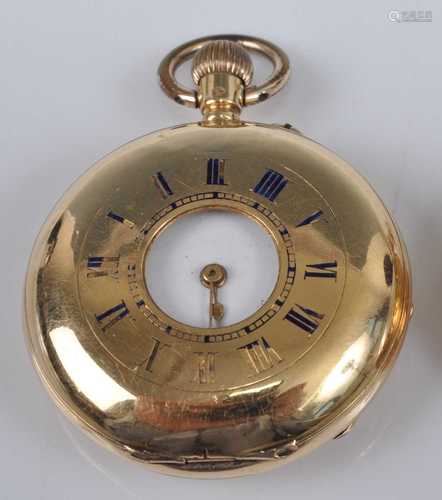 A yellow metal half hunter keyless pocket watch, having roun...