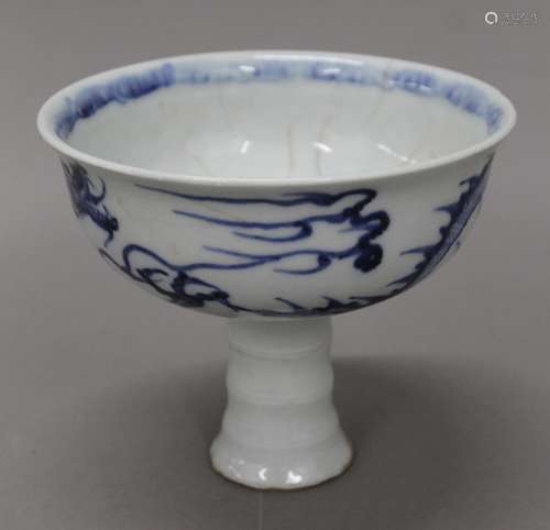 A Chinese blue and white porcelain stem cup. 11 cm high.